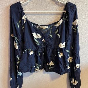 Cropped flower print navy blouse from PacSun